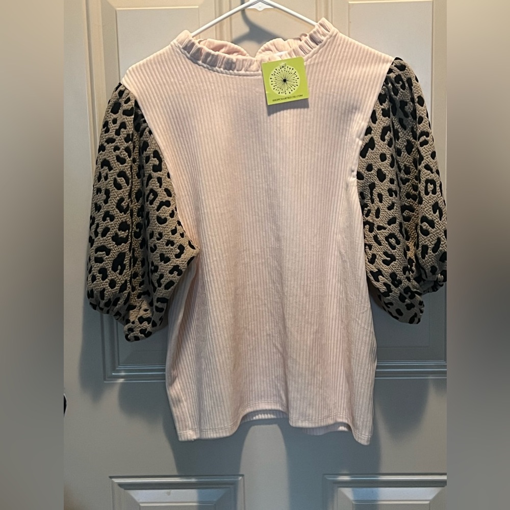 Never worn cute leopard and cream shirt